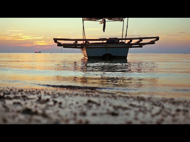 Tropical sunset with fishing boat. slow motion. 1920x1080