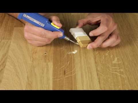 Reparatur eines Kratzers in lackierter Holzoberfläche