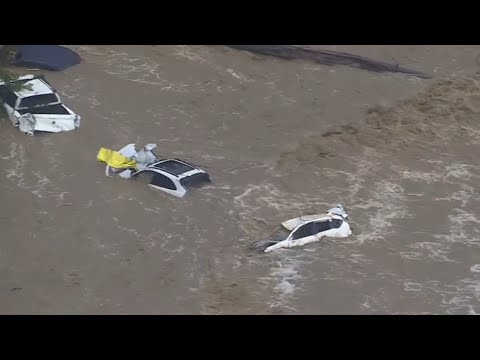 Dozens of cars swallowed by flash flooding in Victoria