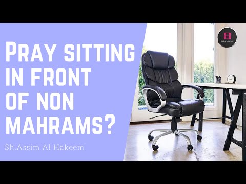 Can women pray sitting down in a chair in the workplace if non mahram men can see her? Assimalhakeem