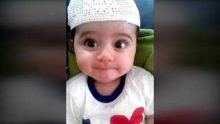 cute baby reading Quran