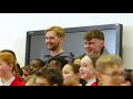 Conor Bradley and Caoimhín Kelleher surprise schoolchildren at LFC Foundation session