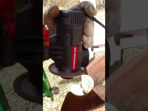 Sharpening the Lucas Sawmill blade.