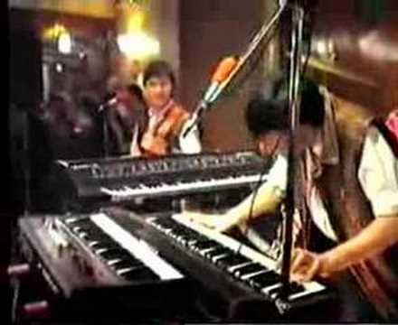 ON THE REBOUND.  FLOYD CRAMER.  MILESTONE EXPRESS LIVE 1984.