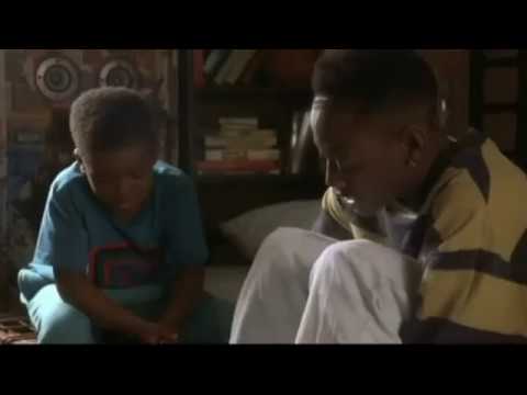 Juice ( Film ) Q tries on shoes