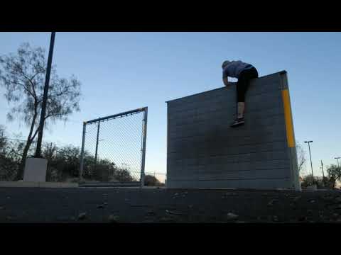 Jumping over 6ft wall and fence for police academy