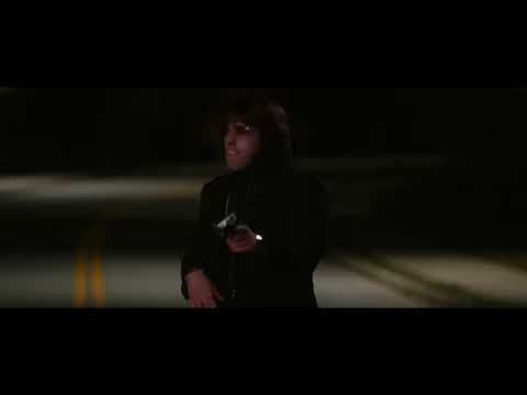 Quick-cut trailer montage: disco dance floor, rooftop scramble, neon skyline — synced to horn stabs