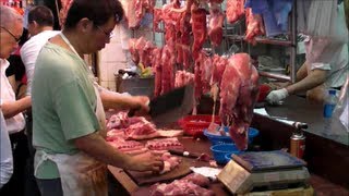 preview picture of video 'Hong Kong. The Meat Market in the Street. Street Food. Chinese Food'