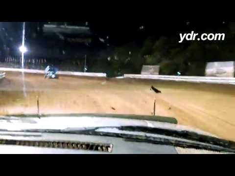 Logan Hess, a junior at York College, pushes drivers out for time trials at Williams Grove.