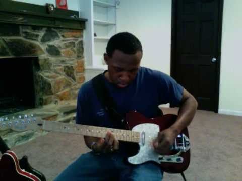 Jermaine Morgan playing guitar chords