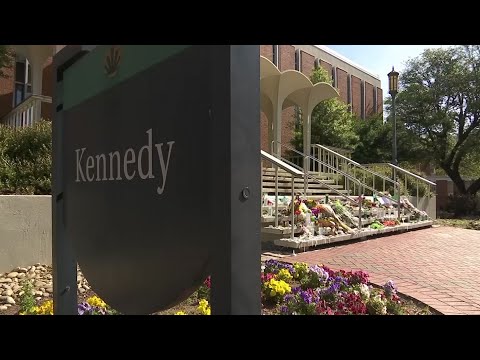 Candles, flowers and cards graced the steps of Kennedy Hall at UNC Charlotte as students work to honor the victim’s of Tuesday’s tragic shooting. (May 2)