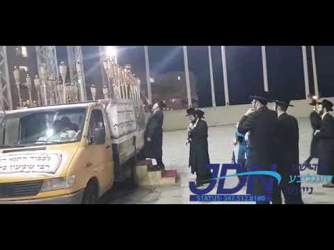 R' Aharon Mordechai Rokeach son of the Belzer Rebbe lighting the Lag baomer truck 5780