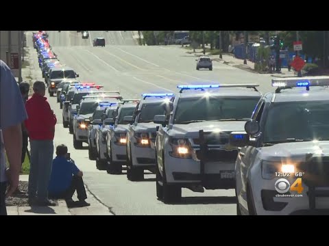 Emergency Responders And Tow Truck Drivers Join Procession For Trooper William Moden