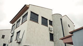 They Turned Two Duplexes Into a 14-Room Hotel