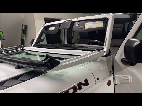How to fold down the windshield on a Jeep Gladiator and install sound deadening.