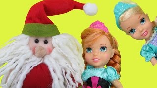 SANTA comes to ELSA & ANNA toddlers ! One of them can't find her gift! Lots of Christmas presents!