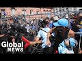 Chaos in Buenos Aires as police clash with Maradona fans over access to wake