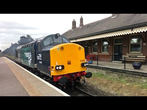 37038 opens up with thrash through Gunton Station