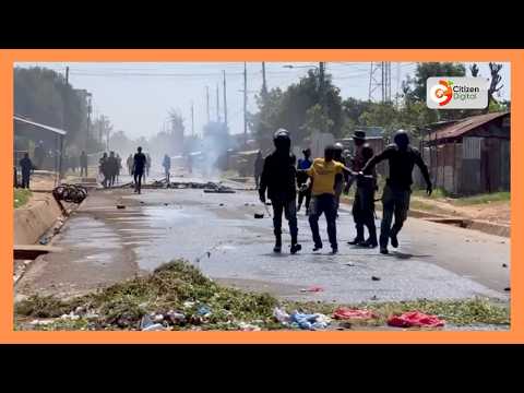 Several protesters arrested as police use tear gas and water cannon to quell Ebola protests