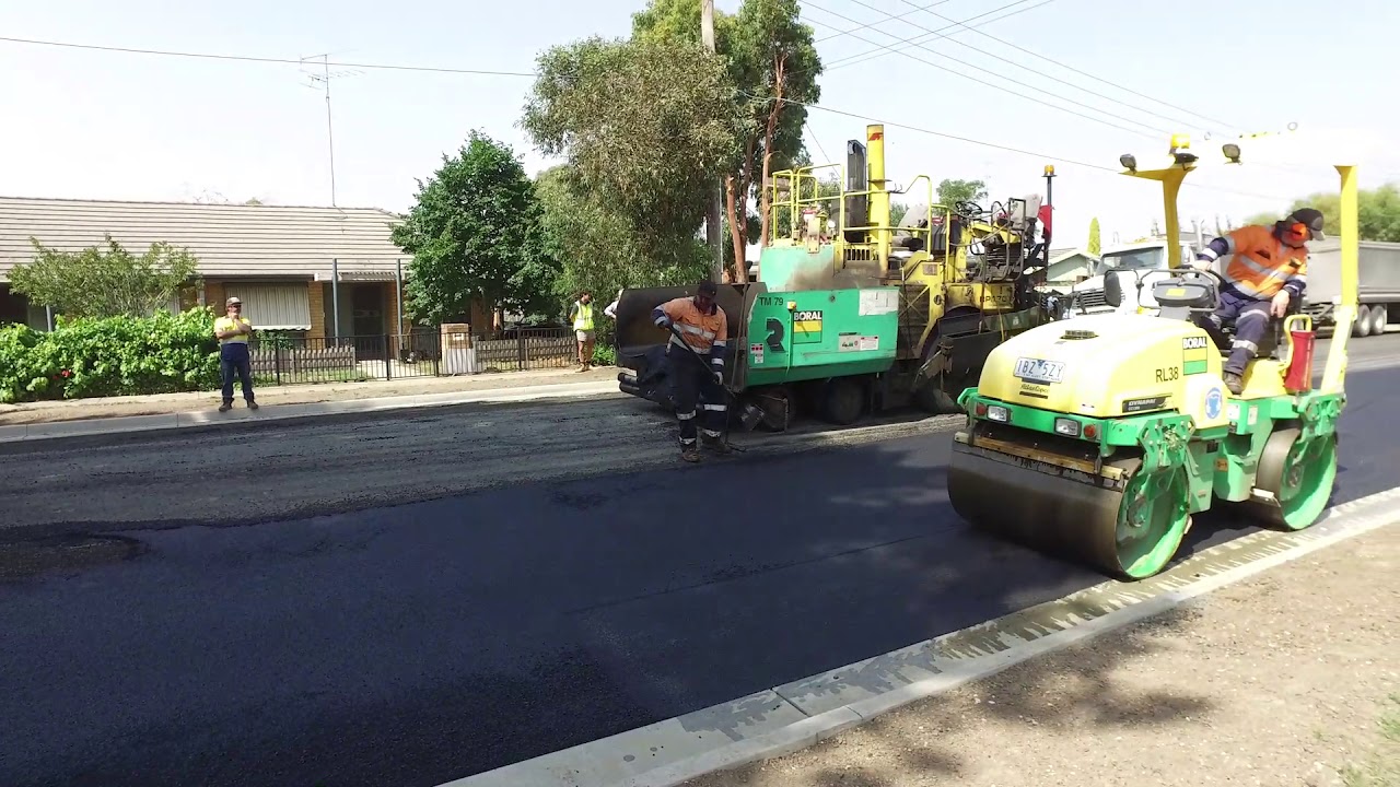Road resurfacing using recyclables