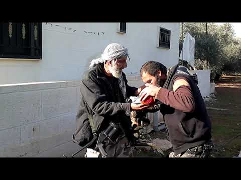 استلام شحنة أسلحة مقدمة من المجلس العسكري في درعا إلى لواء درع اللجاة ضمن معركة عامود حوران