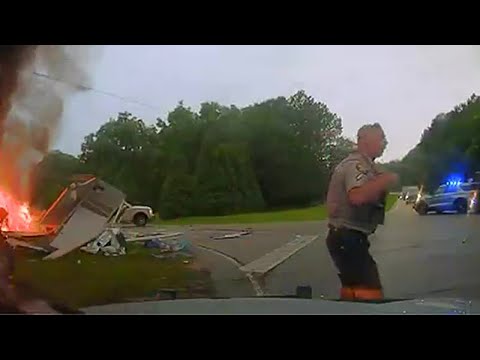 WATCH: Troup County deputy saves 2 people from car in flames