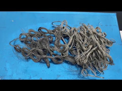 Melting silver coloured copper wire into an ingot