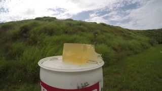 IWI US TAVOR shooting through ballistic gel in slow motion.