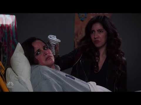 Captain Holt and Terry dancing to distract Amy in labor