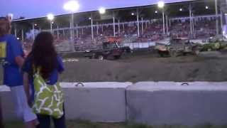 preview picture of video 'David City, NE Butler County Fair Truck Demo Derby 2013 one gets rolled over'