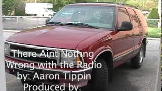 there aint nothing wrong with the radio music video by aaron tippin