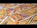 New Indian Currency Of 200 Rupee Notes Falling On A Currency Heap Indian Stock Footage Knot9