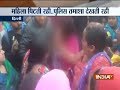 Public and police stare as DCW volunteer allegedly beaten up, stripped by liquor mafias