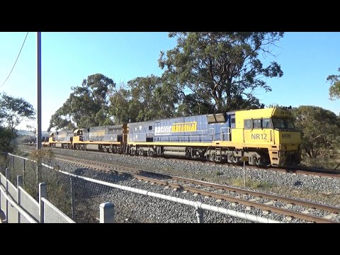 Pacific National NR12, 9322, 9324 6WM2 Steel Passing Kilmore East Station