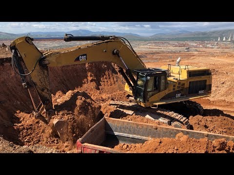 Caterpillar 365C Excavator Loading Mercedes And Man Trucks