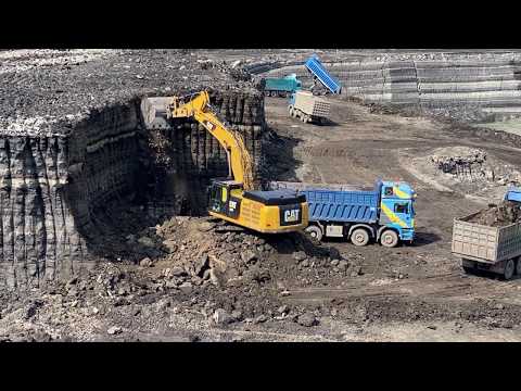 Caterpillar 352F Excavator Loading Trucks