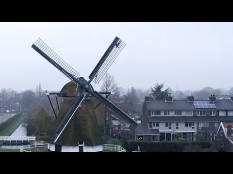 Dutch CEO makes announcement atop a windmill
