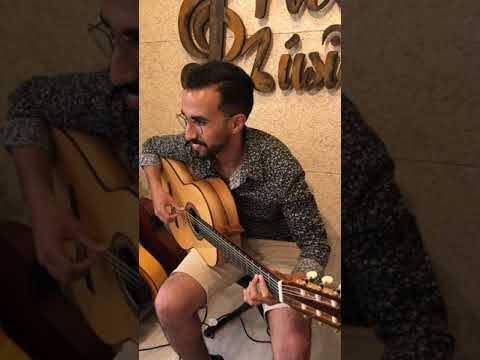 Amine Naami playing guitar in spain por buleria 2019