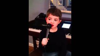 Funny kid sings I'm getting nuttin for Christmas