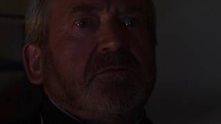 Terry Palmer as Father Danes in Fight the Eternal Evil