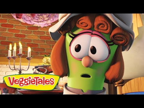 Animated green vegetable character with a hat and large eyes, looking surprised in a kitchen; VeggieTales logo in the lower-left corner.