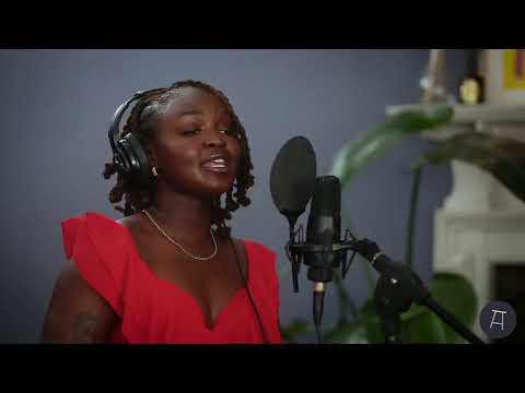 LIZZIE BERCHIE ON THE WOODEN STOOL