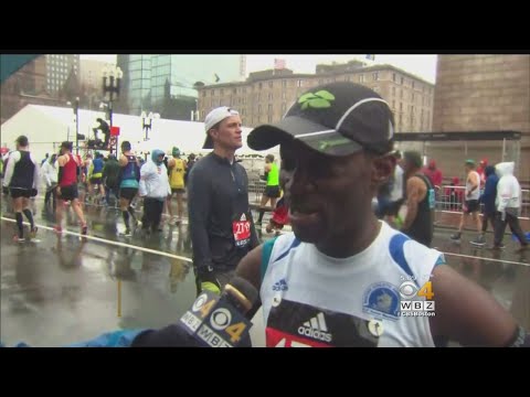 Runners Push Through Bad Weather For Charities, Spectators