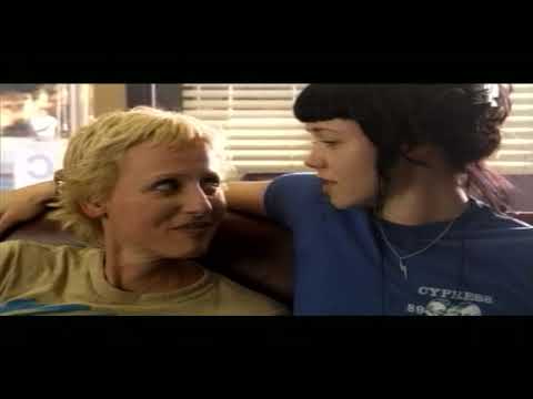 Prey for Rock & Roll trailer still: Gina Gershon onstage with Clam Dandy in a small LA club