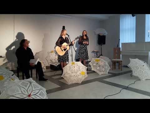 Atlikėjos Rima Žudienė ir Radvilė Kraujalytė Poezijos ir gitaros improvizacijų vakare Rokiškio Juozo Keliuočio viešojoje bibliotekoje. Aguonos (žodžiai Albino Kuliešio, muzika Rimos Žudienės).