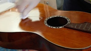 Restoring an antique parlour guitar part 32: French polishing with olive oil