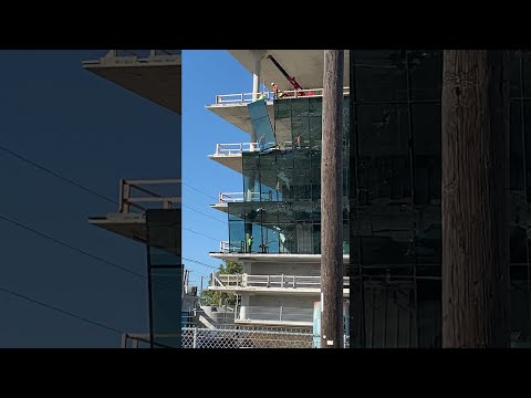 Construction Workers Break Large Glass Window || ViralHog