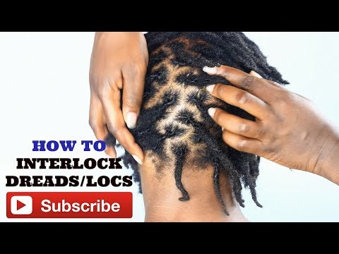 Easy way to interlock locs with a crochet needle -   Crochet needles  for hair, Rasta hair, How to retwist dreads