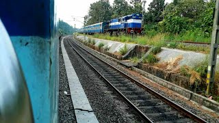 preview picture of video 'Netravati Express leaving Kerala's biggest railway station nd crossing Nilambur Kottayam passenger'