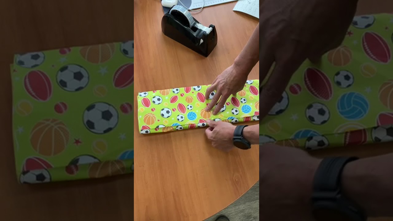 Wrapping up an Advent book for Book Grocer's Book Advent Calendar